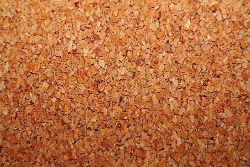 The light springy bark of the cork oak, used for stoppers, boards and flooring.