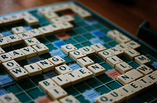 The board game in which players build words on a lettered grid.